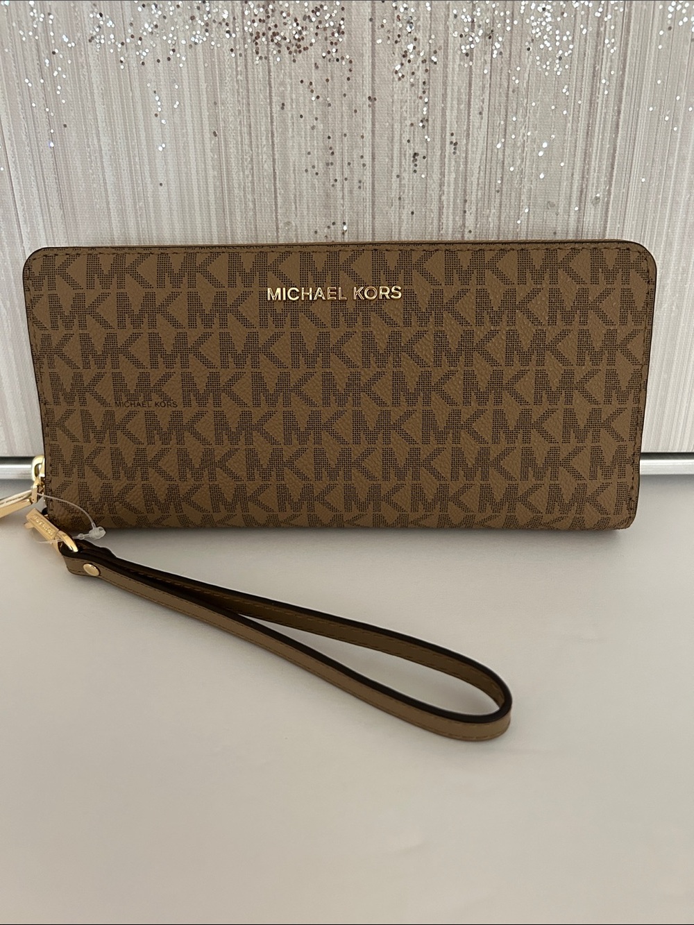 Michael Kors signature logo Jet set travel wallet.